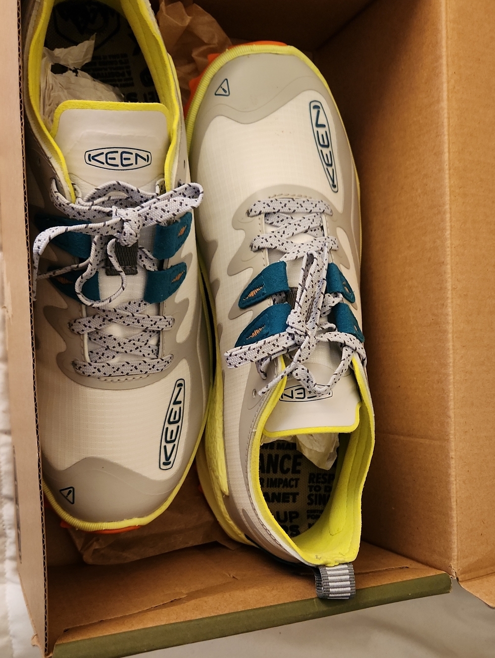 Keen Women's White Athletic Sneakers with Teal and Yellow Accents
